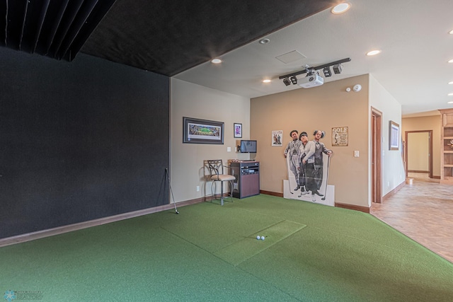 interior space featuring carpet and golf simulator