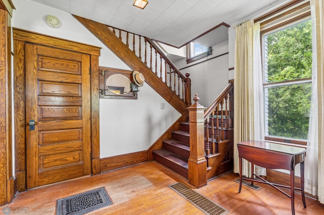 entrance foyer featuring hardwood / wood-style floors