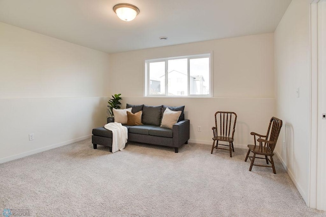 sitting room with light colored carpet