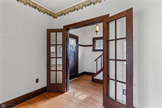 foyer featuring wood-type flooring