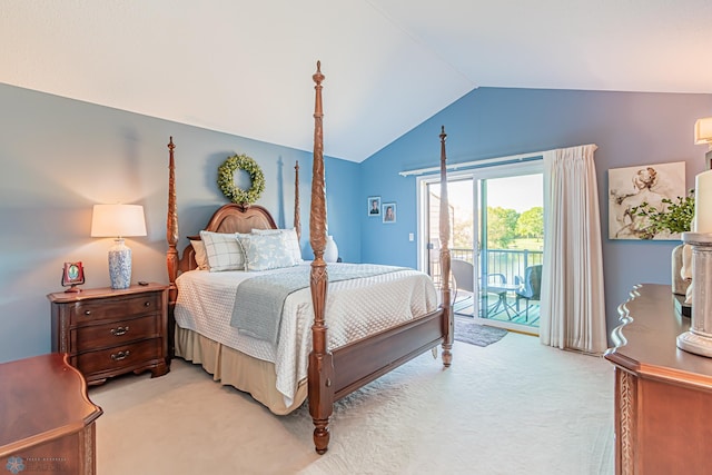 carpeted bedroom with access to outside and lofted ceiling