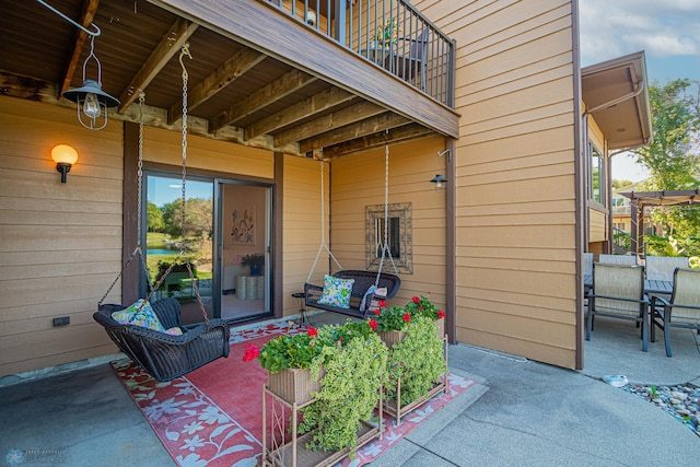 view of patio with a balcony