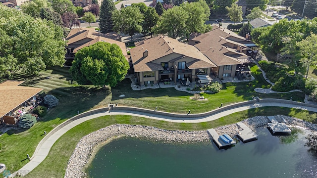 drone / aerial view with a water view