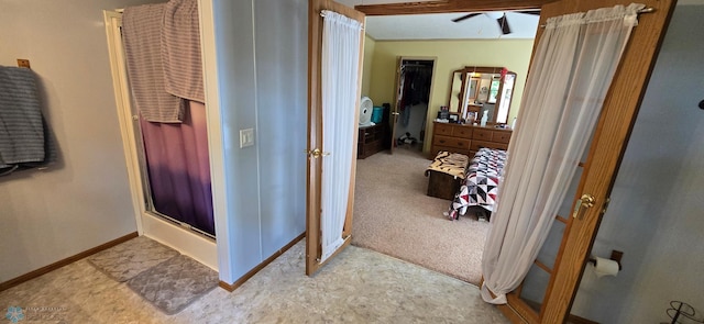 bathroom featuring ceiling fan