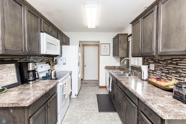 kitchen with dark brown cabinets, decorative backsplash, white appliances, and sink