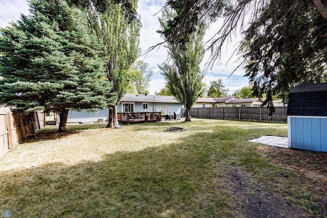 view of yard with a deck