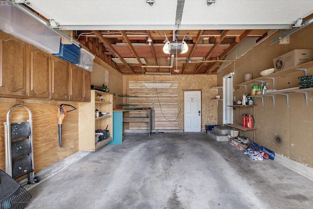 garage featuring a garage door opener