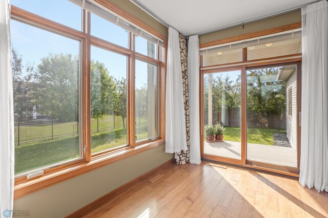 empty room with light hardwood / wood-style floors