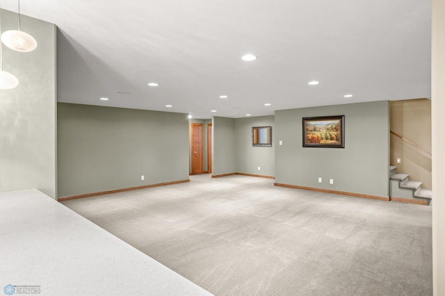 interior space featuring light carpet