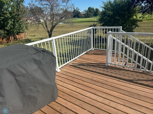 wooden deck with area for grilling