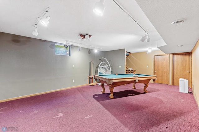 game room with pool table, carpet, and rail lighting