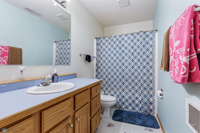 bathroom featuring vanity, toilet, a textured ceiling, and a shower with shower curtain