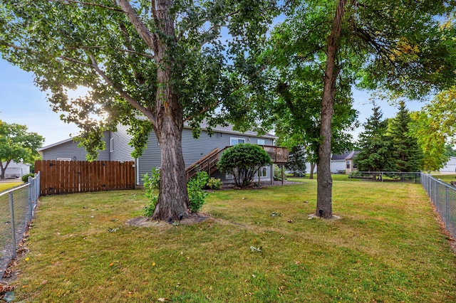 view of yard with a deck