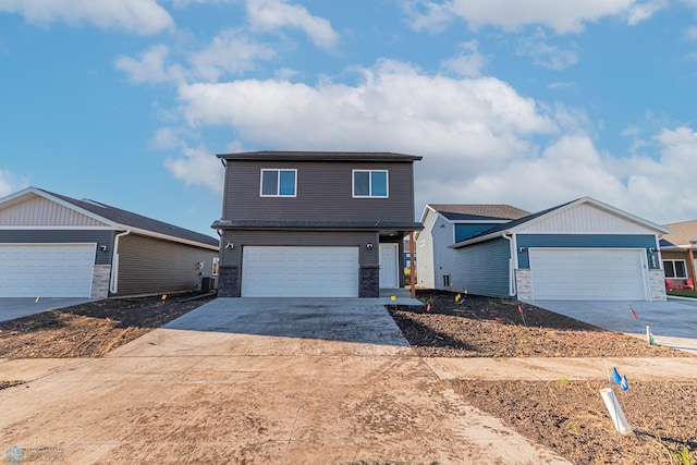 view of front of property featuring a garage