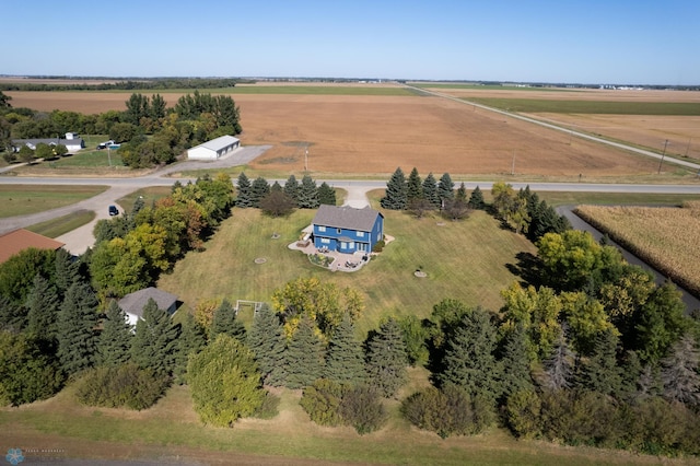 birds eye view of property featuring a rural view