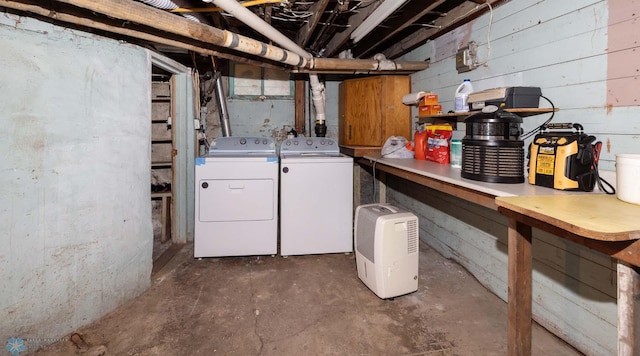 basement with separate washer and dryer