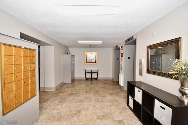 corridor with light carpet, a textured ceiling, and elevator