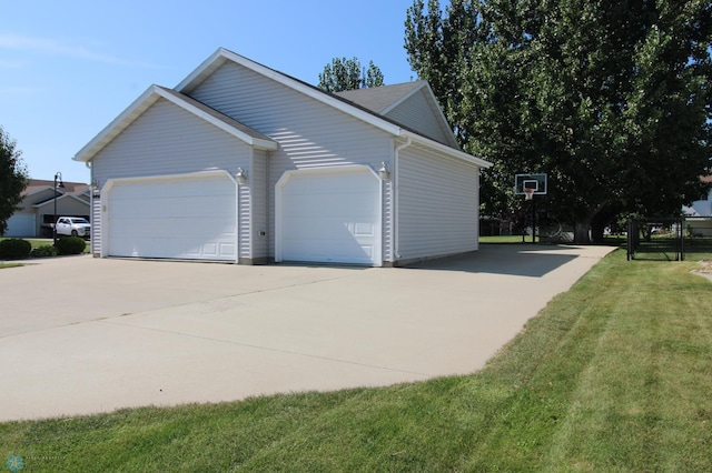 view of side of home with a yard