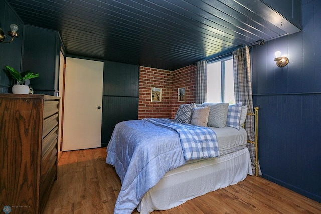 bedroom featuring hardwood / wood-style flooring