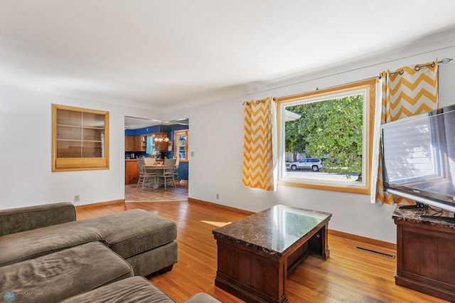 living room featuring light wood-type flooring