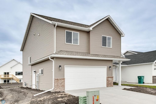 view of front of home with a garage