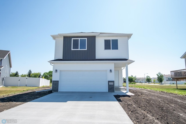 front of property featuring a garage