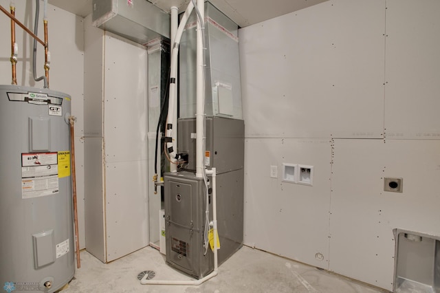 utility room featuring water heater