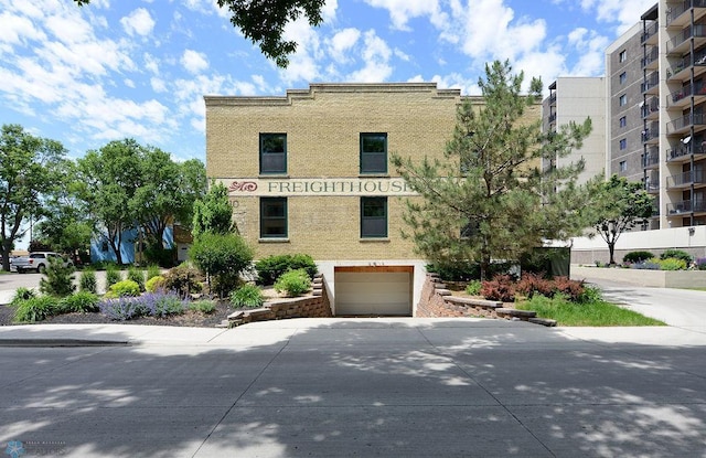 view of building exterior featuring a garage