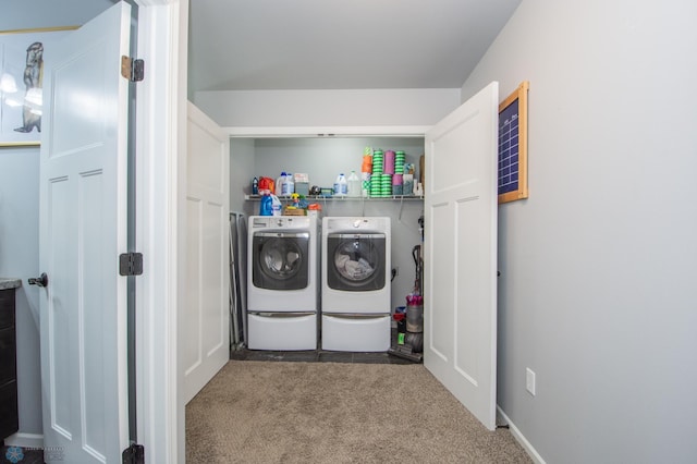 laundry room featuring carpet and washing machine and dryer