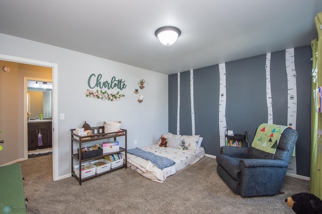 bedroom with carpet and ensuite bath