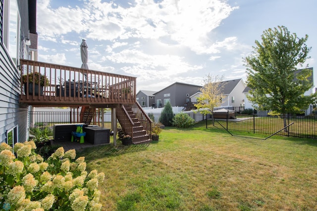 view of yard with a wooden deck