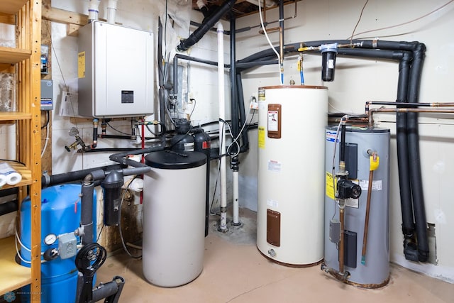 utility room featuring electric water heater and tankless water heater