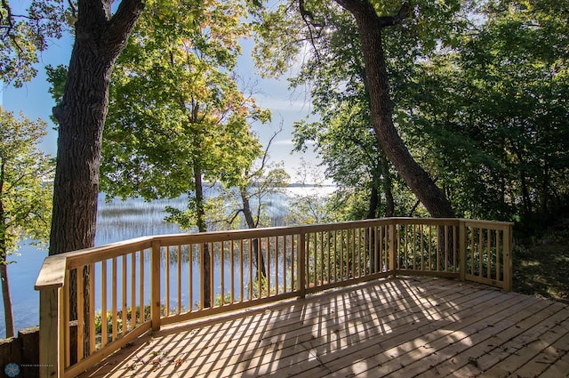 wooden terrace with a water view