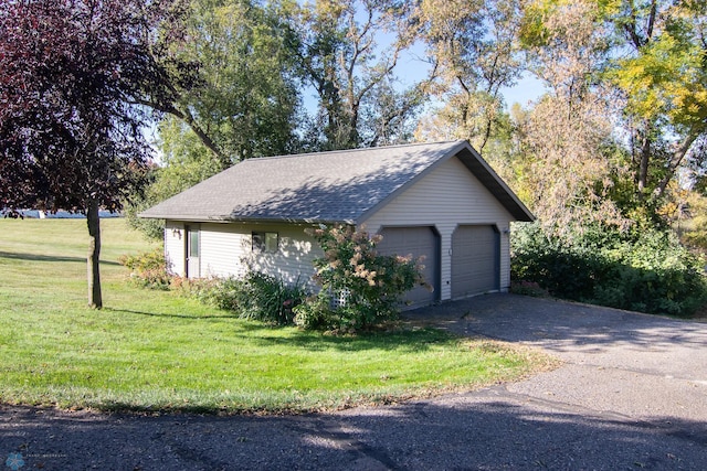 view of property exterior with a yard