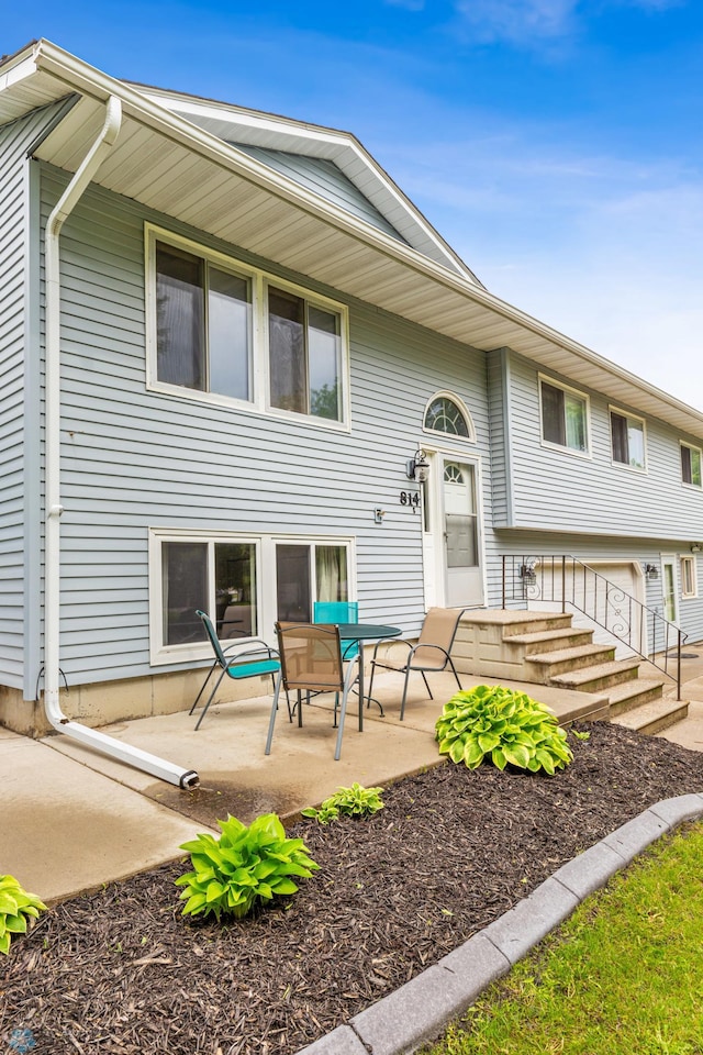 view of front of home featuring a patio