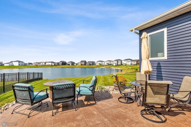 view of patio / terrace with a water view