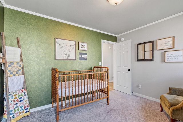 bedroom with carpet flooring, ornamental molding, and a nursery area