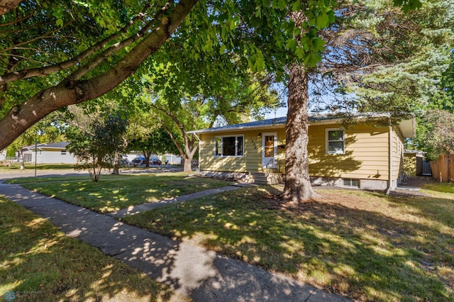 view of front of house with a front yard