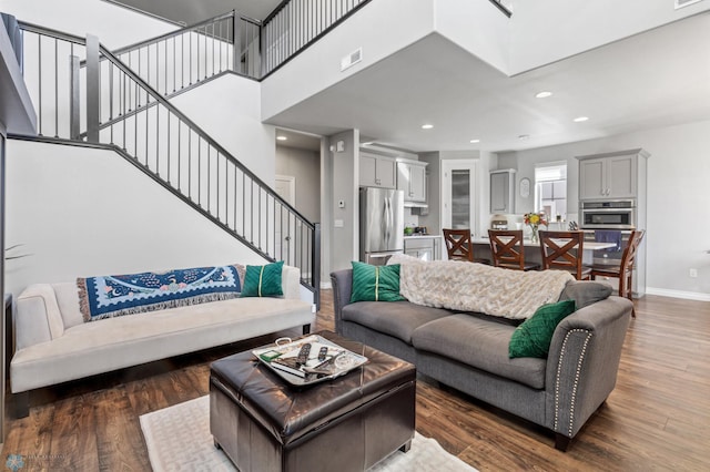 living room featuring dark hardwood / wood-style flooring