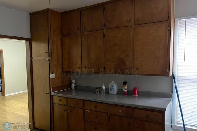 kitchen with light hardwood / wood-style floors