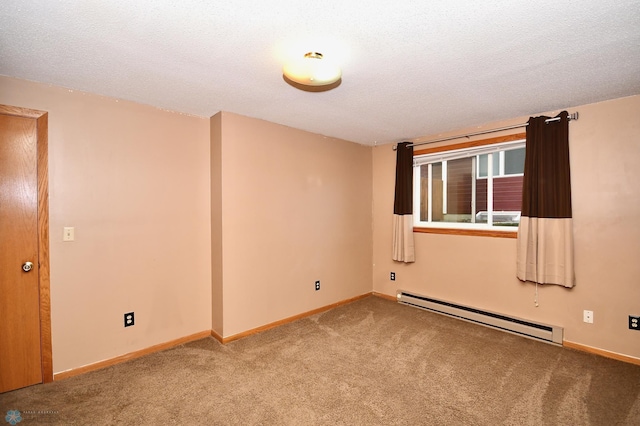 empty room featuring a textured ceiling, carpet flooring, and a baseboard radiator