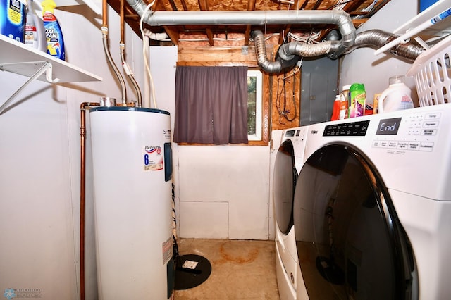 clothes washing area with electric water heater, electric panel, and separate washer and dryer