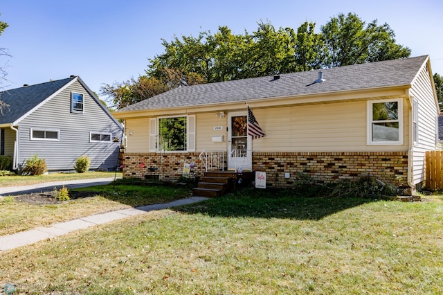 view of front of home with a front lawn