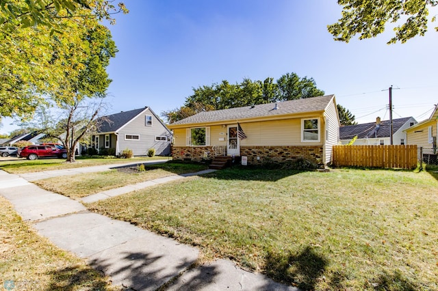 view of front of home featuring a front yard