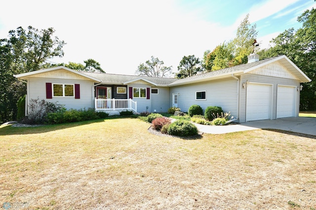 single story home featuring a front lawn, a porch, and a garage