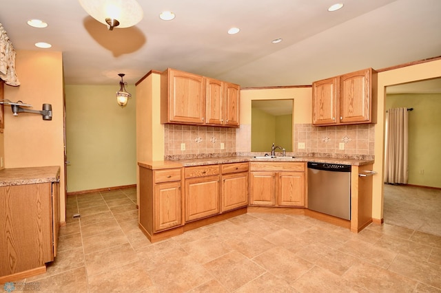 kitchen featuring decorative backsplash, sink, decorative light fixtures, and stainless steel dishwasher