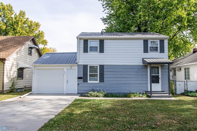 front facade featuring a front lawn and a garage