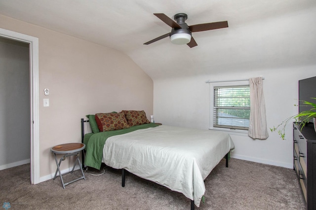 bedroom featuring vaulted ceiling, ceiling fan, and carpet flooring