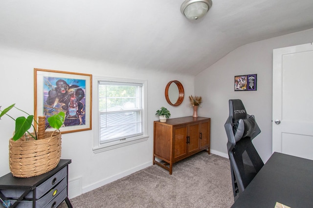 office featuring light colored carpet and lofted ceiling