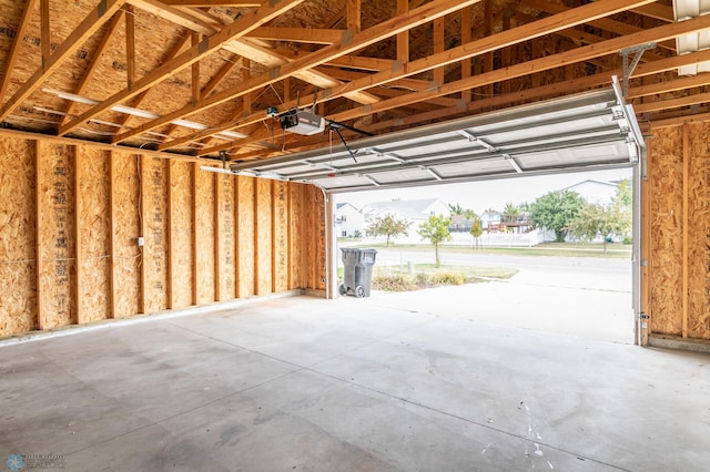 garage featuring a garage door opener